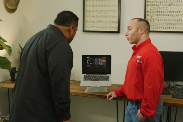 Technician Showing Customer Internet Plans